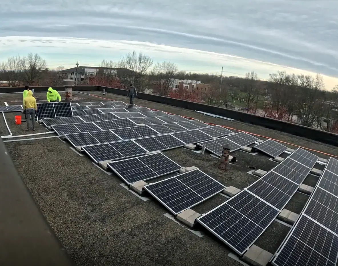 Image of worker lowering blocks